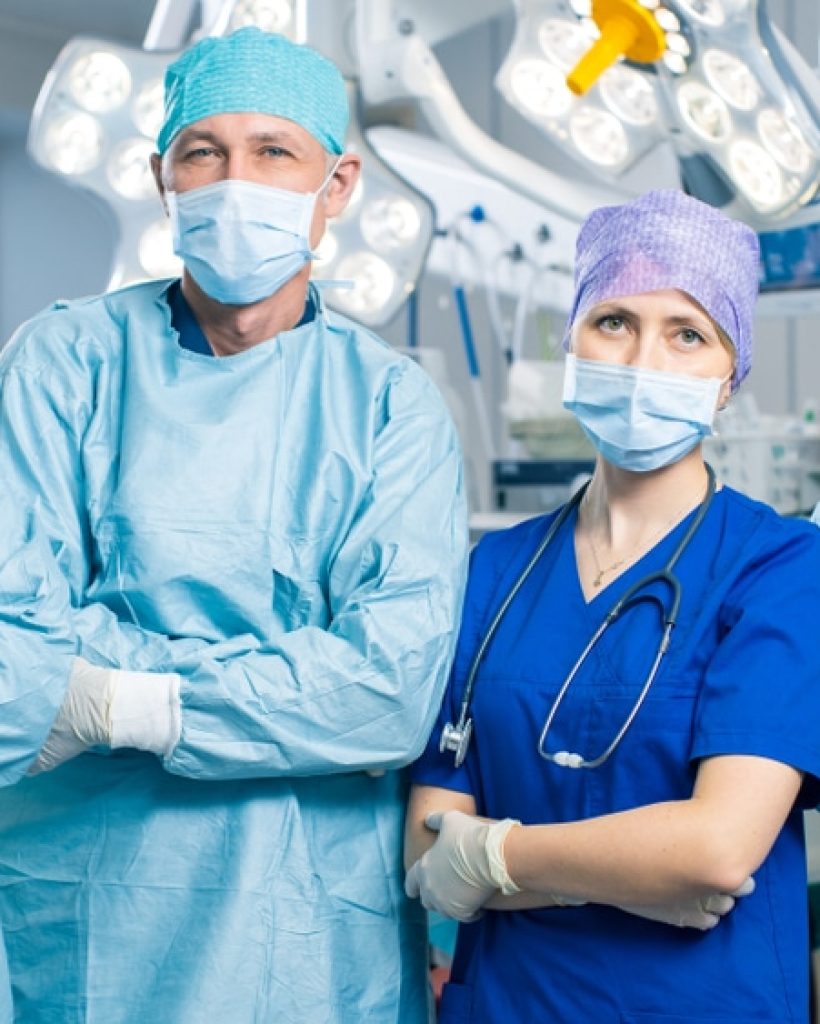 Diverse,Team,Of,Professional,Surgeon,,Assistants,And,Nurses,Standing,Proudly